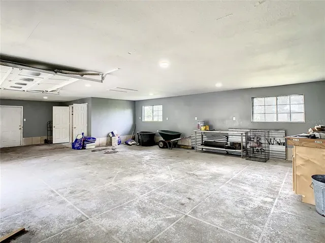 a view of a livingroom with furniture and a fireplace