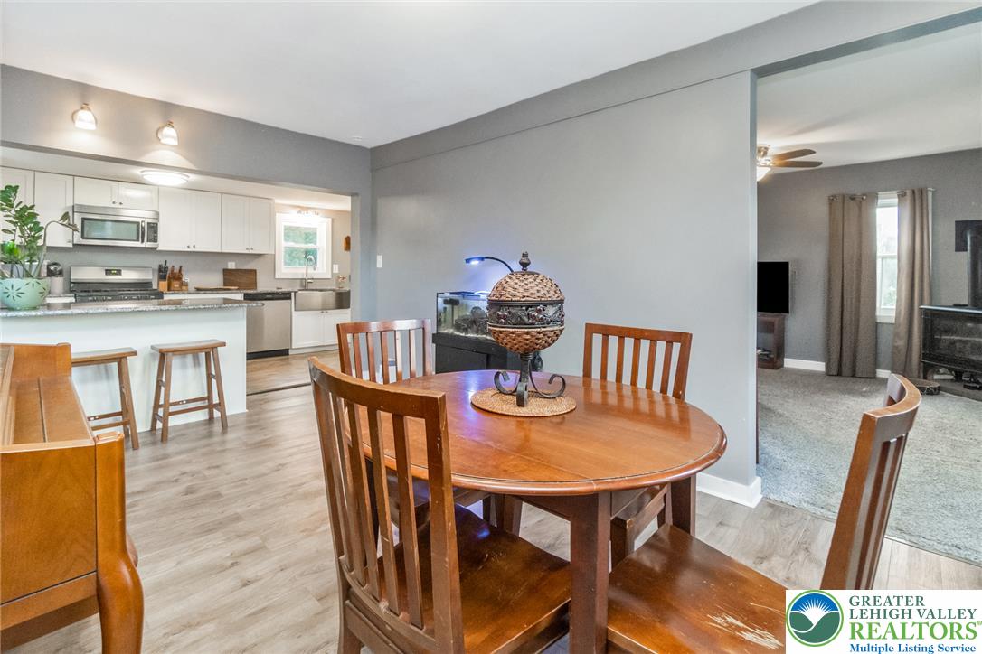 506 Richmond Road Bangor, PA 18013 - Photo 43 of 43 An open floor plan seamlessly connects the dining area to the kitchen and living spaces.