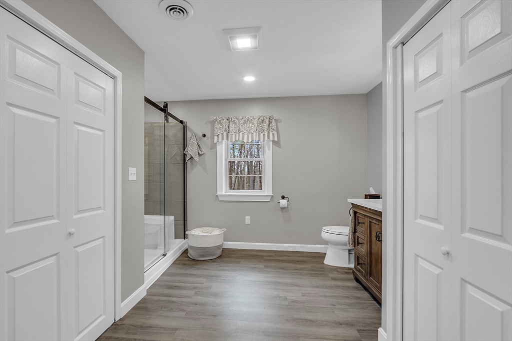 35 Bathrick Westminster, MA 01473 - Photo 17 of 36 a bathroom with a sink toilet and shower