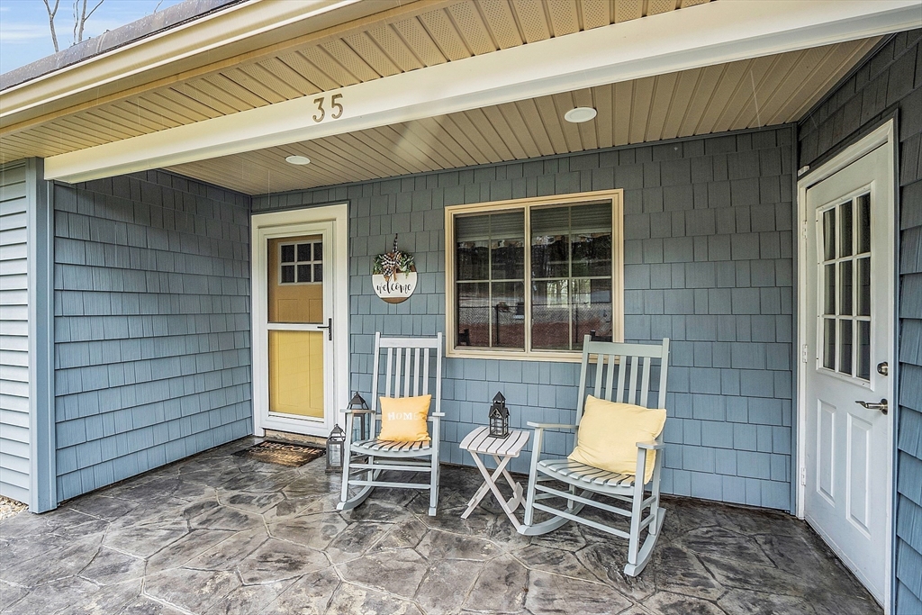 35 Bathrick Westminster, MA 01473 - Photo 2 of 36 a view of a backyard with chair and table and chairs and couch