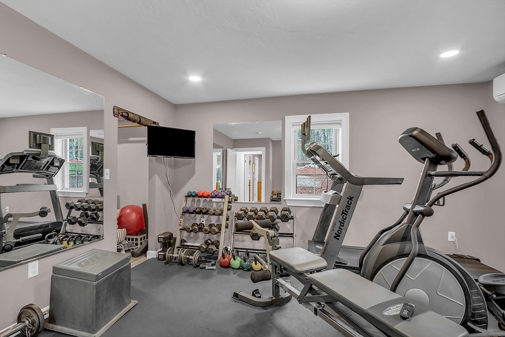 35 Bathrick Westminster, MA 01473 - Photo 24 of 36 a room with gym equipment and mirror