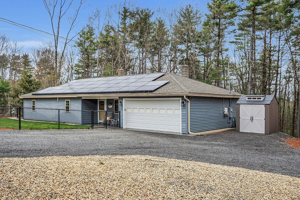35 Bathrick Westminster, MA 01473 - Photo 3 of 36 a front view of a house with a yard and garage