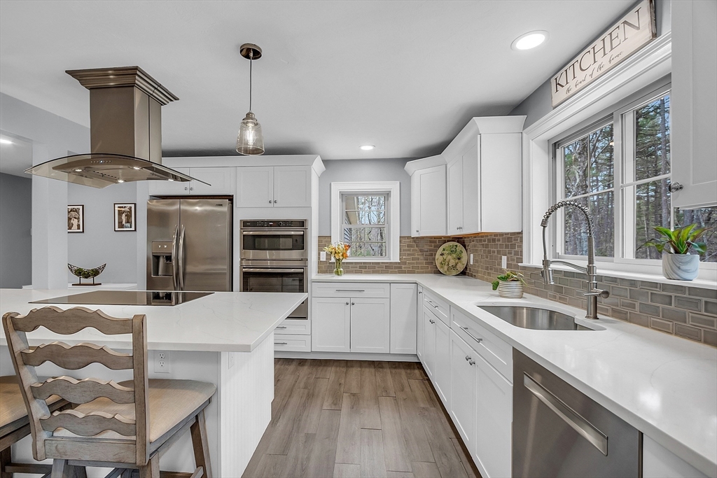 35 Bathrick Westminster, MA 01473 - Photo 6 of 36 a kitchen with a stove a sink and a refrigerator
