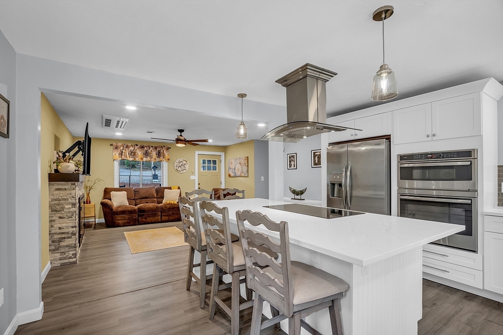 35 Bathrick Westminster, MA 01473 - Photo 7 of 36 a view of a dining room with furniture window and wooden floor