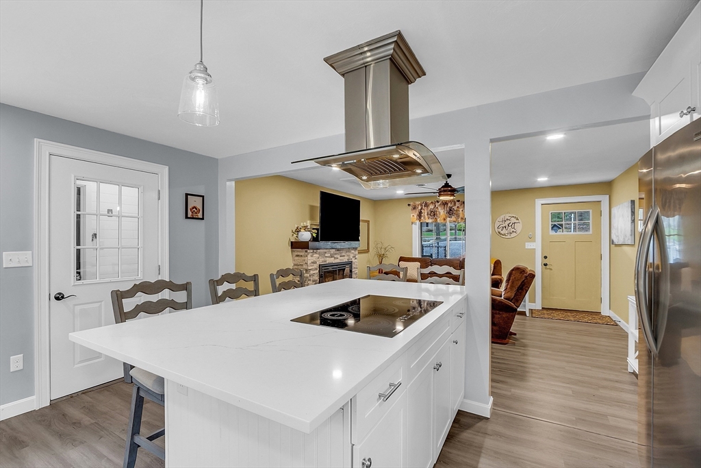 35 Bathrick Westminster, MA 01473 - Photo 8 of 36 a kitchen with a sink a counter space and stainless steel appliances