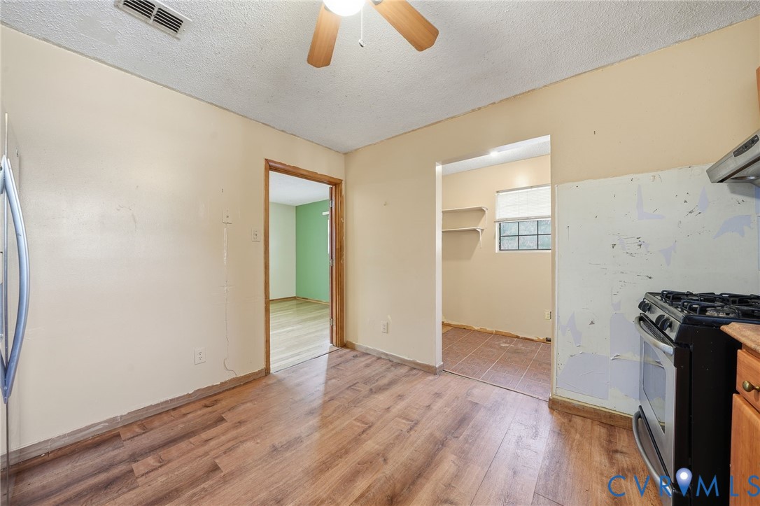 3881 Strawberry Plains Road Williamsburg, VA 23188 - Photo 13 of 29 wooden floor in an empty room