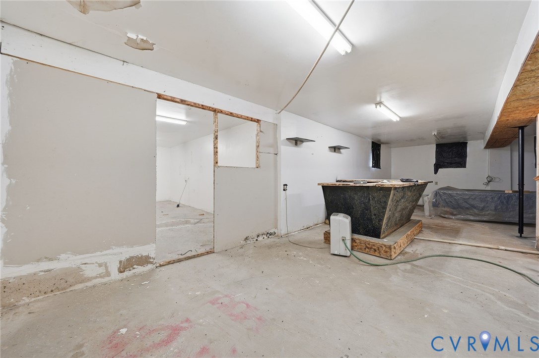 3881 Strawberry Plains Road Williamsburg, VA 23188 - Photo 18 of 29 a view of empty room with wooden floor