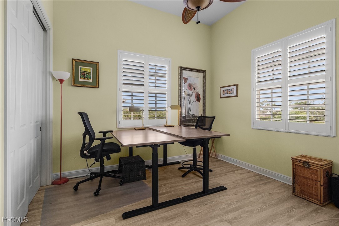 3728 Agualinda Boulevard, Unit 304 Cape Coral, FL 33914 - Photo 13 of 25 a view of a workspace with furniture and a window