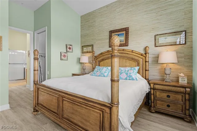 a bedroom with a bed and furniture