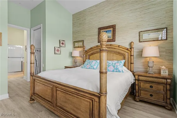 a bedroom with a bed and furniture