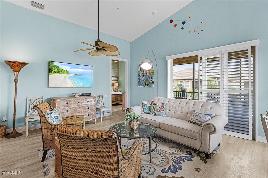 3728 Agualinda Boulevard, Unit 304 Cape Coral, FL 33914 - Photo 2 of 25 a living room with furniture and window