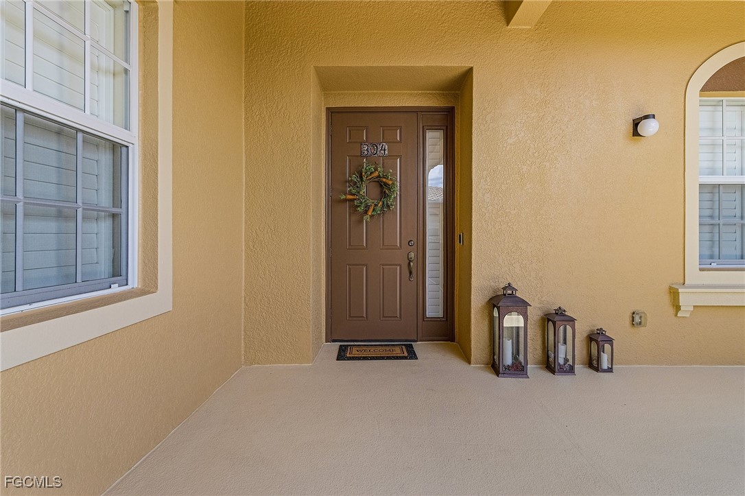 3728 Agualinda Boulevard, Unit 304 Cape Coral, FL 33914 - Photo 4 of 25 a view of a livingroom with closet