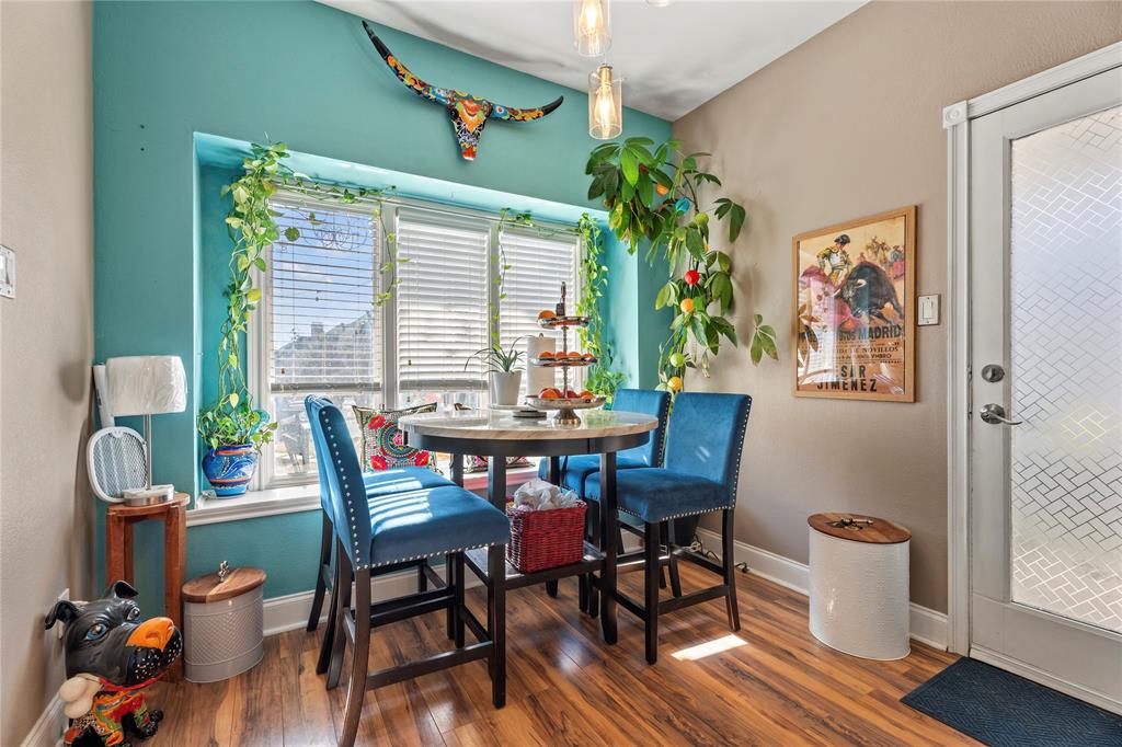 3910 Kingsferry Court Arlington, TX 76016 - Photo 12 of 32 a view of a dining room with furniture window and wooden floor