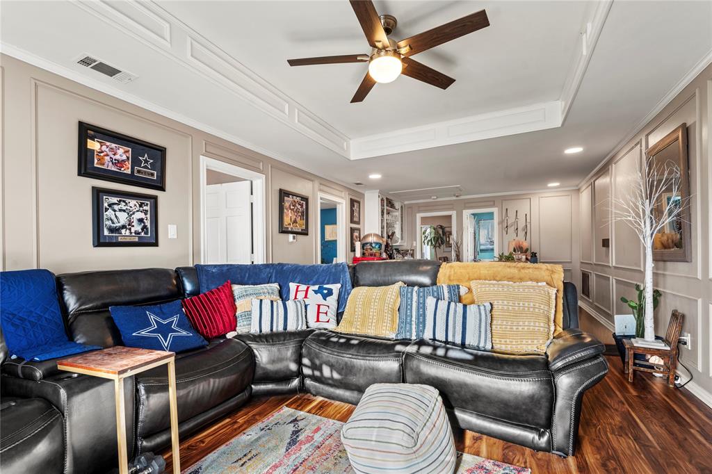 3910 Kingsferry Court Arlington, TX 76016 - Photo 19 of 32 a living room with furniture and a wooden floor