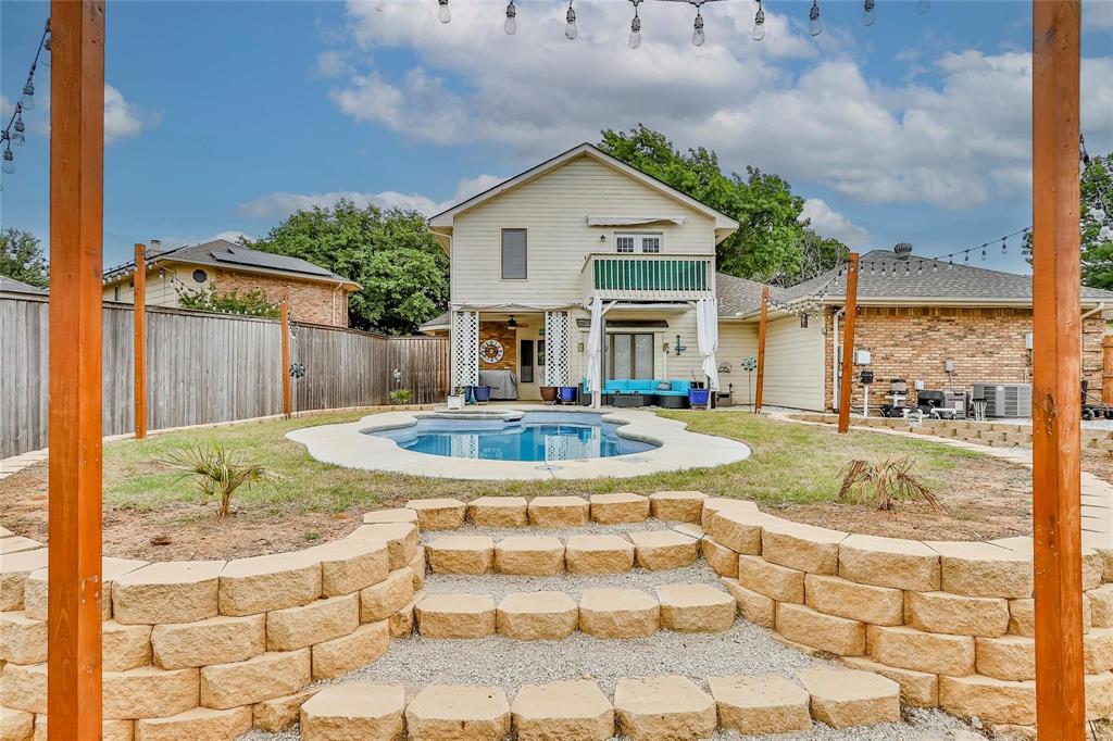 3910 Kingsferry Court Arlington, TX 76016 - Photo 28 of 32 a view of outdoor space yard and swimming pool