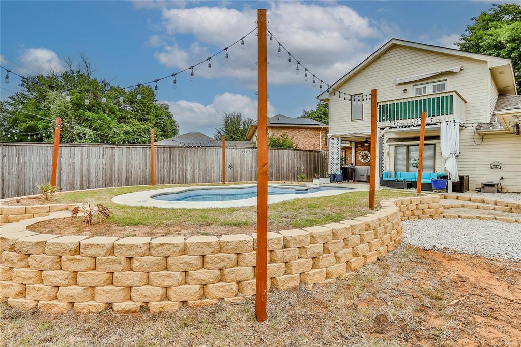3910 Kingsferry Court Arlington, TX 76016 - Photo 29 of 32 a view of a house with a yard