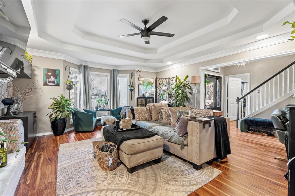 3910 Kingsferry Court Arlington, TX 76016 - Photo 6 of 32 a living room with furniture ceiling fan and a rug