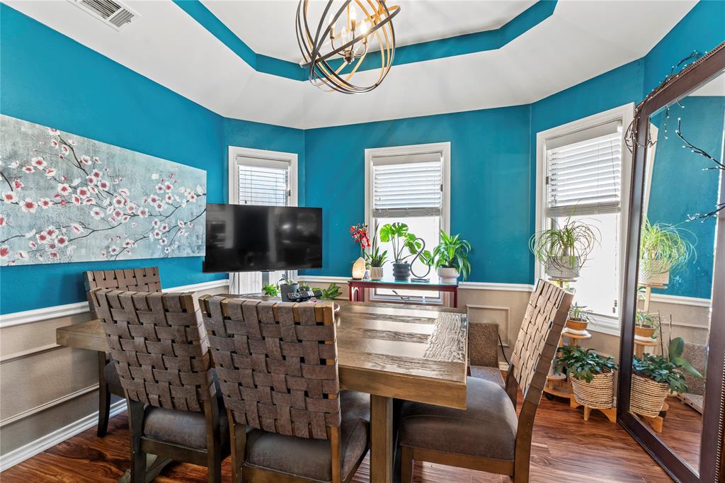 3910 Kingsferry Court Arlington, TX 76016 - Photo 8 of 32 a view of a dining room with furniture window and wooden floor