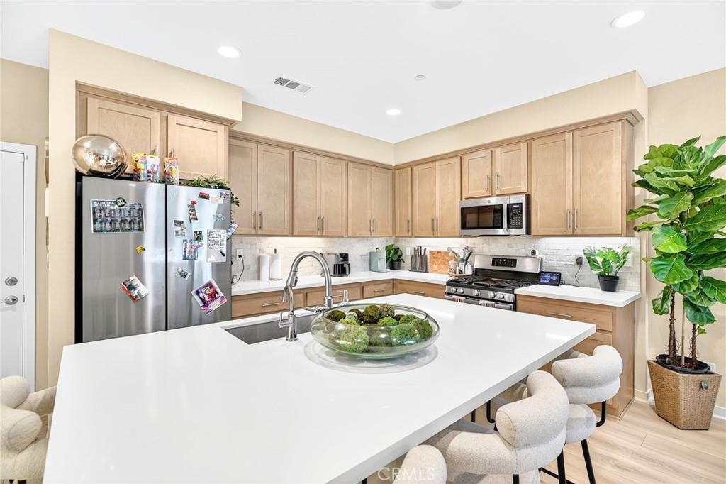 39400 Corvina Lane Temecula, CA 92591 - Photo 14 of 42 a view of a dining room with furniture