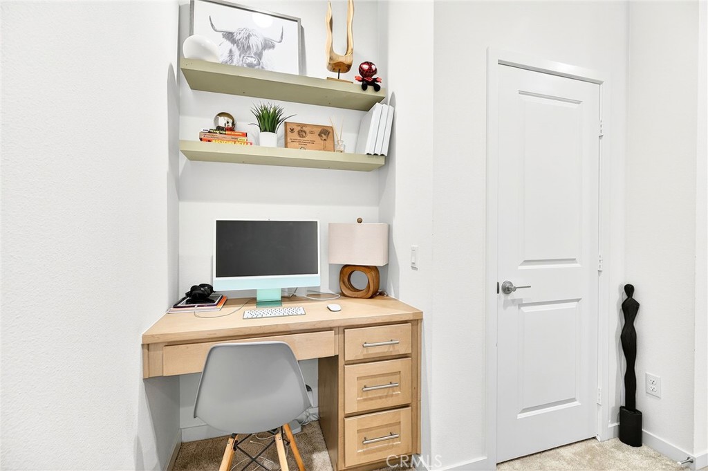 39400 Corvina Lane Temecula, CA 92591 - Photo 21 of 42 a workspace with furniture and hardwood floor