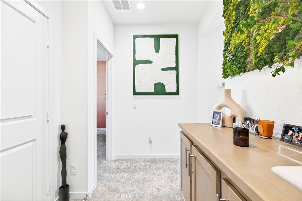 39400 Corvina Lane Temecula, CA 92591 - Photo 22 of 42 a room with a sink and a mirror