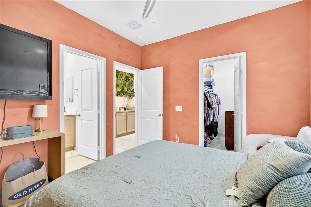 39400 Corvina Lane Temecula, CA 92591 - Photo 26 of 42 a bedroom with a bed and a flat screen tv