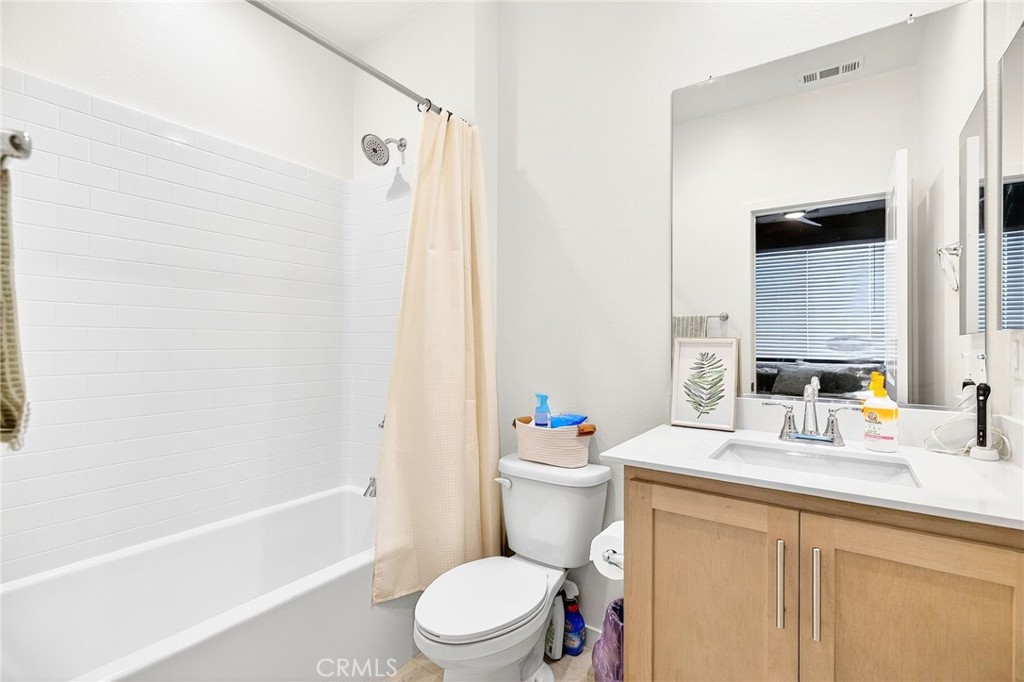 39400 Corvina Lane Temecula, CA 92591 - Photo 27 of 42 a bathroom with a sink a toilet and shower