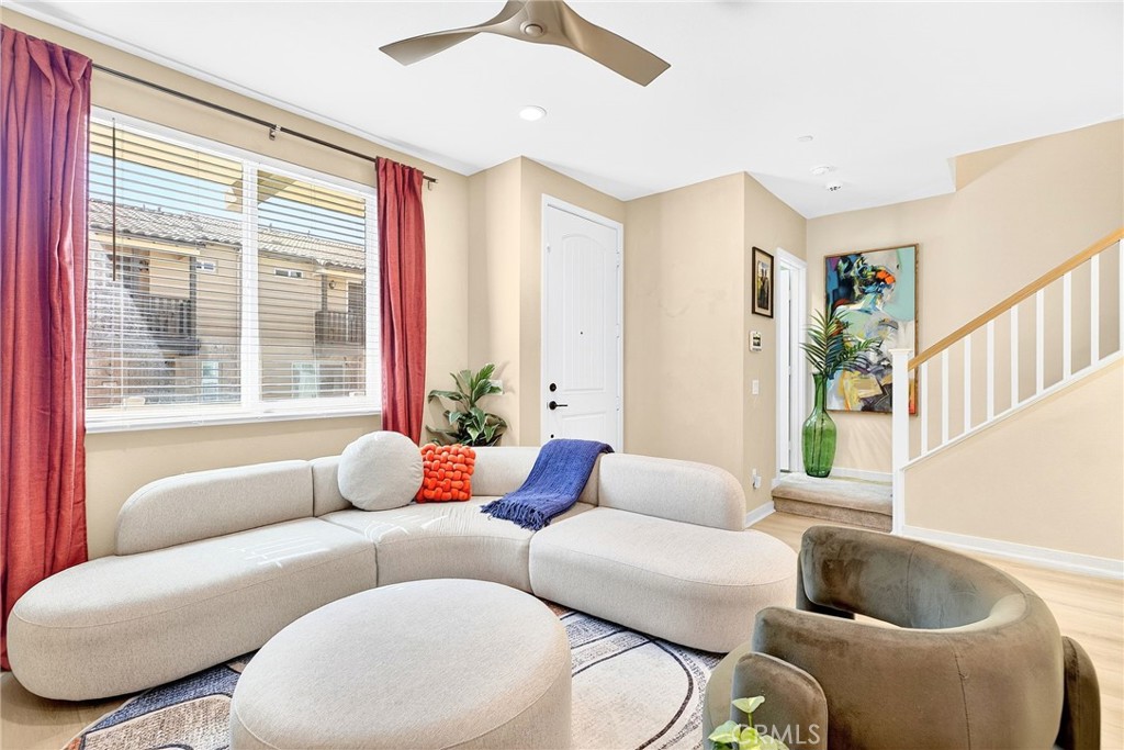 39400 Corvina Lane Temecula, CA 92591 - Photo 10 of 42 a living room with furniture and a large window