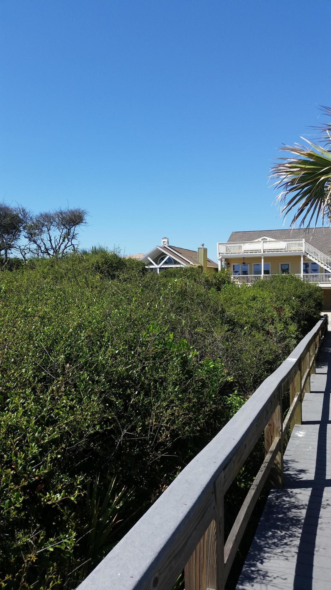 Lot 5 Sand Cliffs Dr Inlet Beach Inlet Beach, FL 32461 - Photo 9 of 10 a view of a balcony with wooden fence and floor