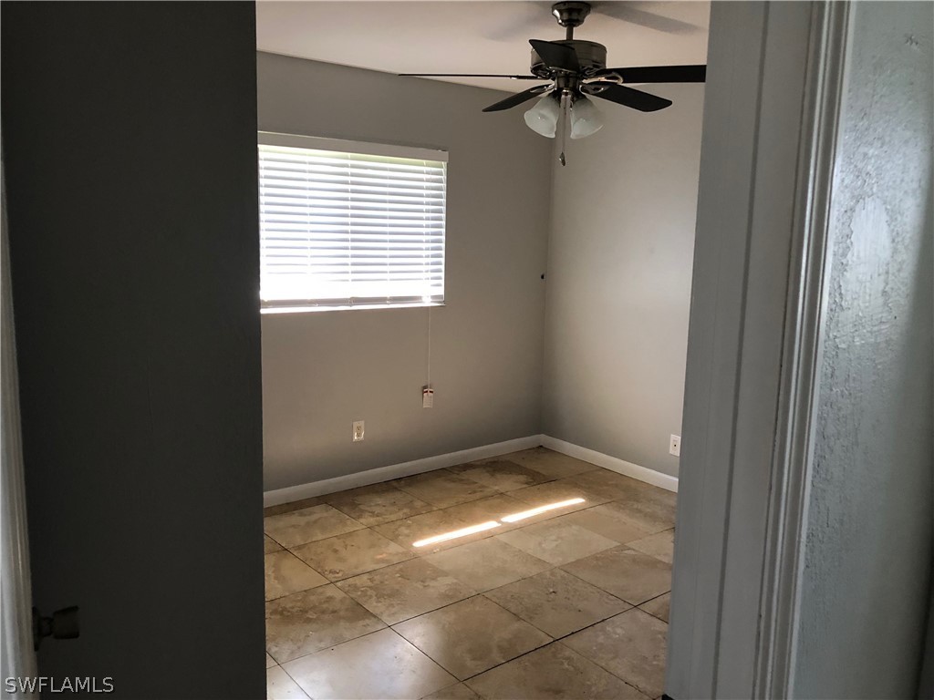 7535 Morgan Road Fort Myers, FL 33967 - Photo 13 of 19 a view of a window in an empty room