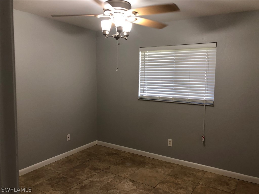 7535 Morgan Road Fort Myers, FL 33967 - Photo 14 of 19 an empty room with a window