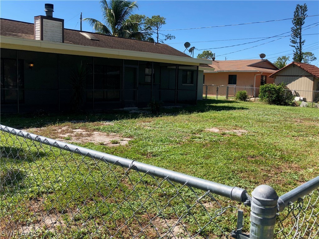 7535 Morgan Road Fort Myers, FL 33967 - Photo 19 of 19 a house view with a garden space