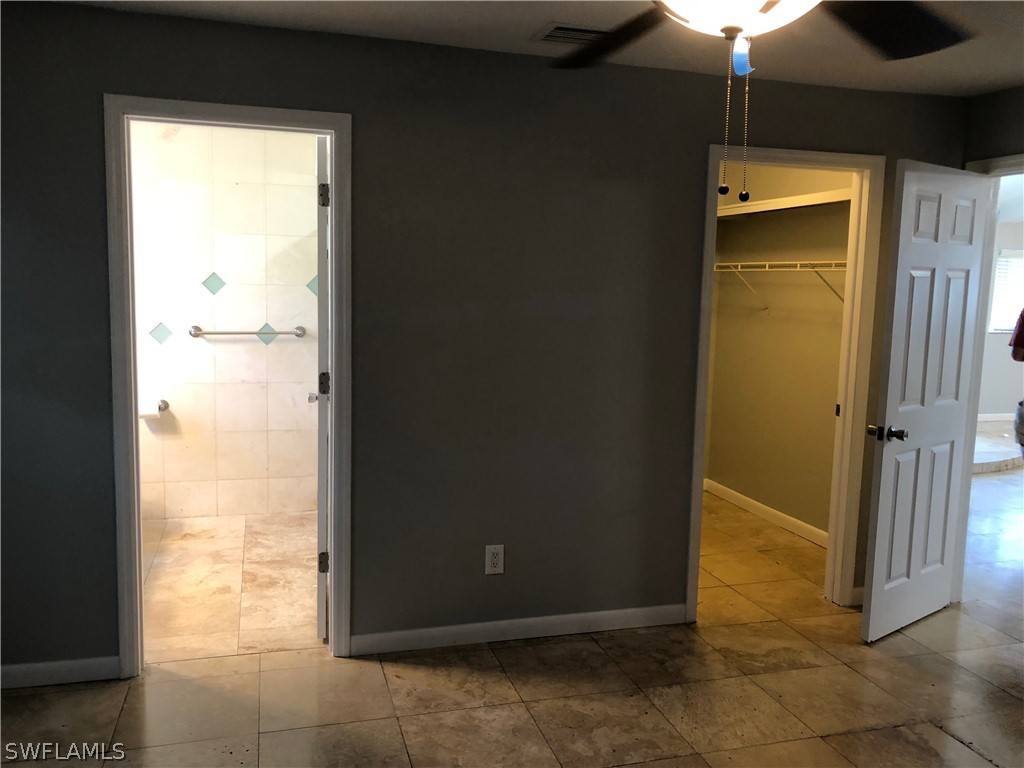 7535 Morgan Road Fort Myers, FL 33967 - Photo 9 of 19 a view of a bathroom with a glass door