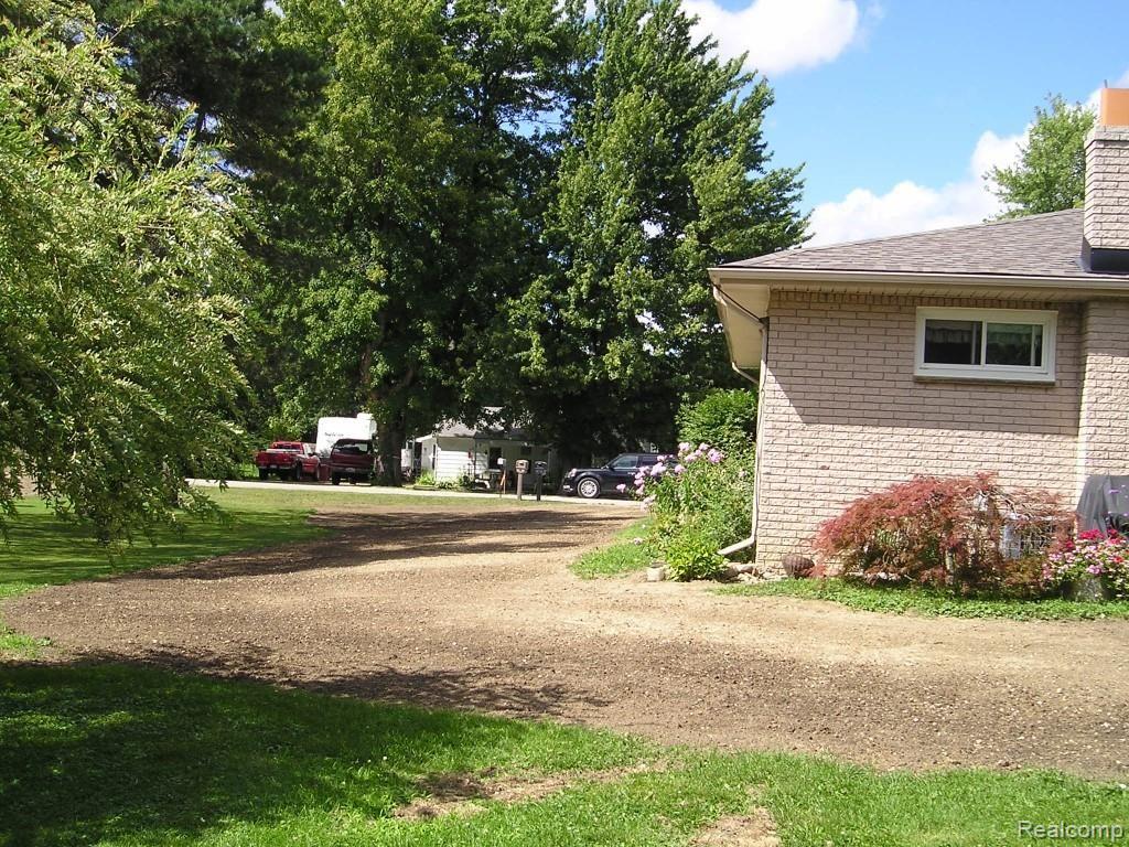 13845 Hough Road Allenton, MI 48002 - Photo 4 of 30 New seeded lawn.