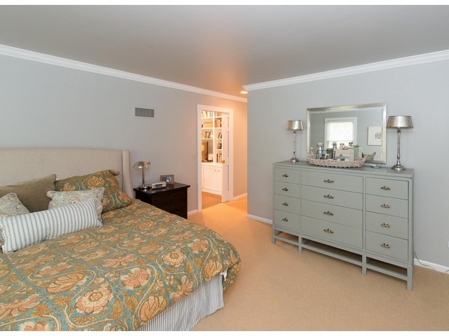 764 Locust Street Winnetka, IL 60093 - Photo 20 of 25 a bedroom with a bed and a dresser