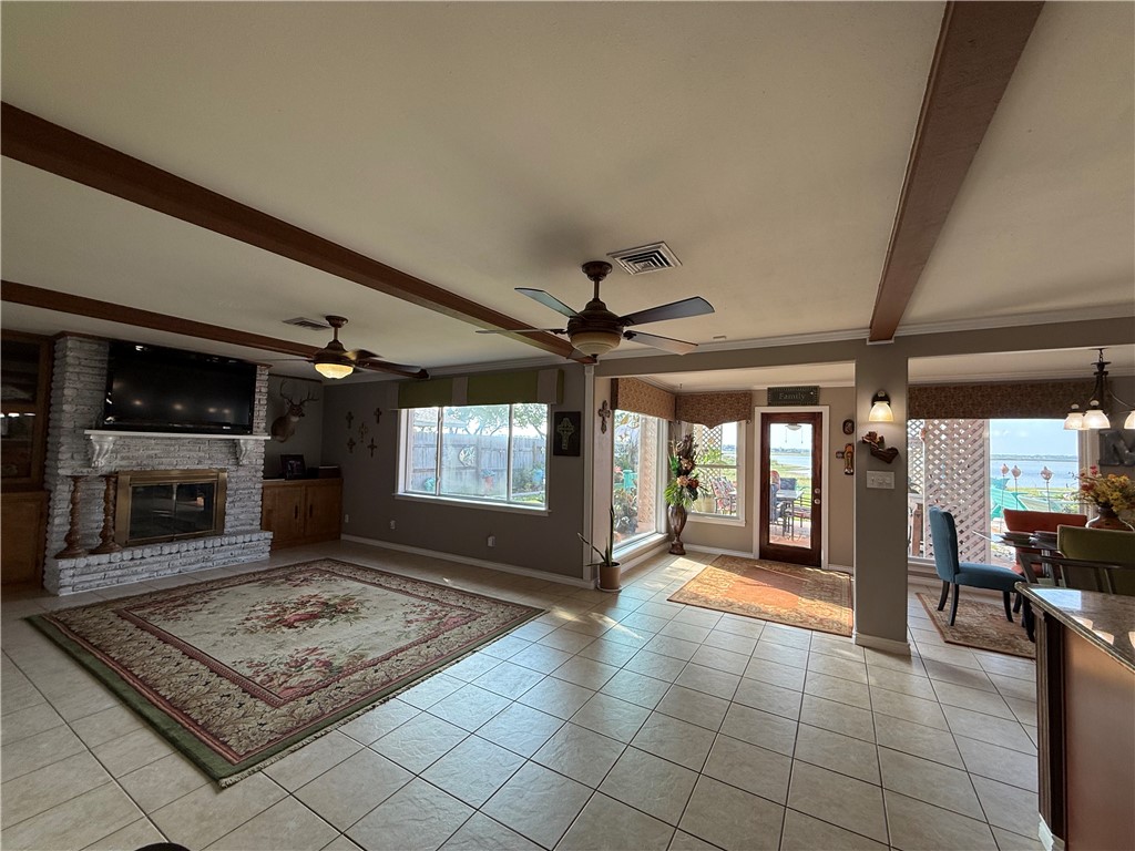 116 Sunset Drive Mathis, TX 78368 - Photo 24 of 40 an empty room with windows and fireplace