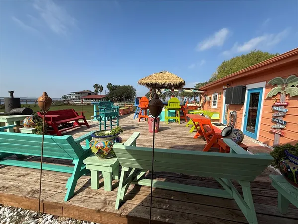 a view of a chairs and table in the terrace
