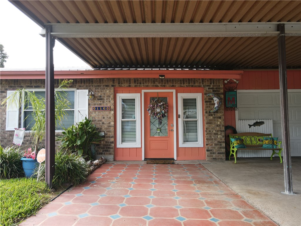 116 Sunset Drive Mathis, TX 78368 - Photo 4 of 40 a view of a house with a porch