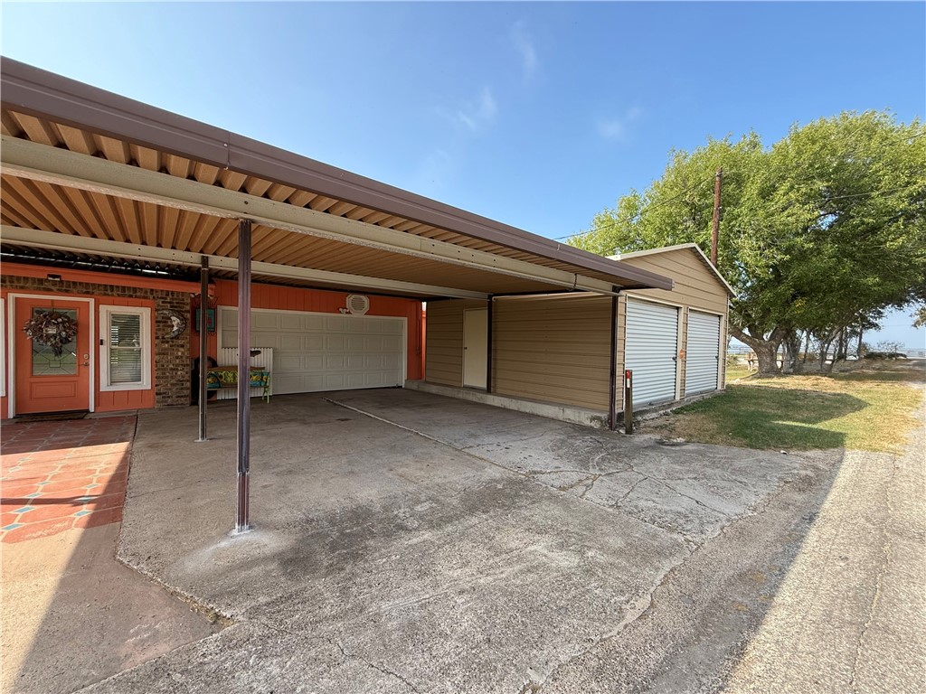 116 Sunset Drive Mathis, TX 78368 - Photo 8 of 40 a view of a house with a backyard