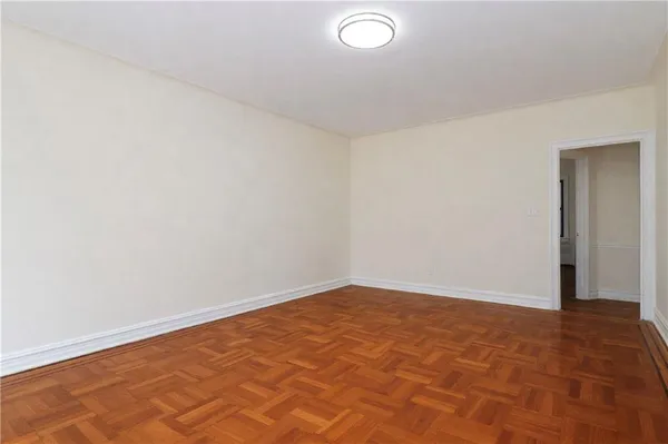 an empty room with an entryway