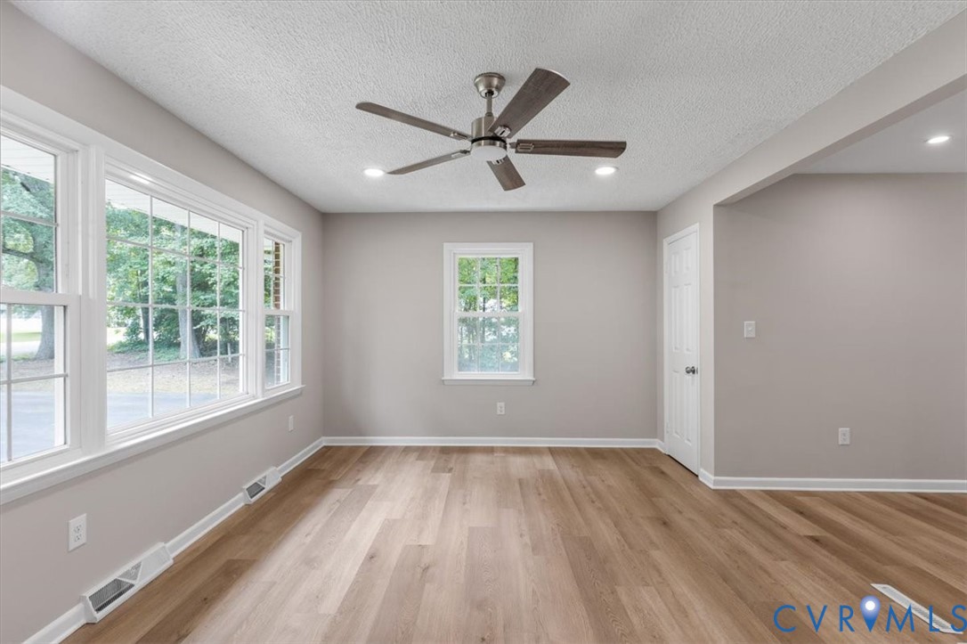 3308 Sylvania Road Chester, VA 23831 - Photo 6 of 55 Wood-finish flooring, white trim, recessed lightin