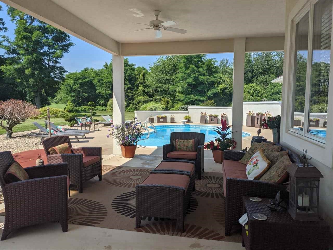 238 Fort Defiance Road Fort Defiance, VA 24437 - Photo 50 of 50 a living room with patio furniture and a garden