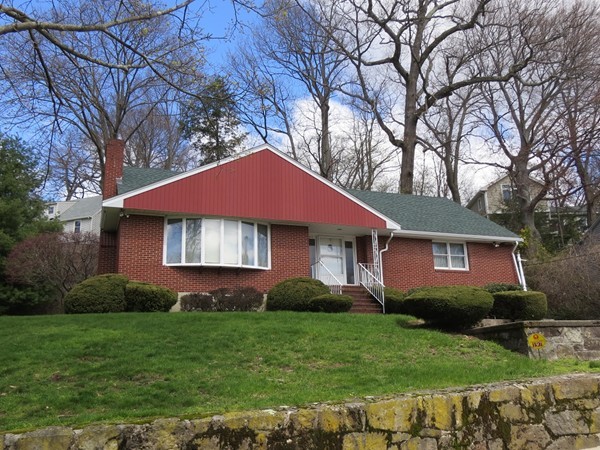 197 Gardner Road Brookline, MA 02445 - Photo 2 of 30 a front view of a house with a yard