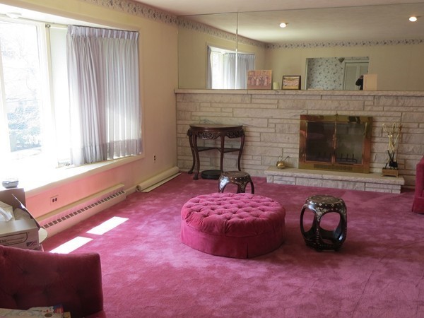 197 Gardner Road Brookline, MA 02445 - Photo 7 of 30 a bedroom with a bed and a fireplace