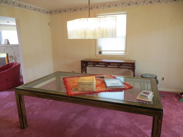 197 Gardner Road Brookline, MA 02445 - Photo 10 of 30 a room with storage and a window