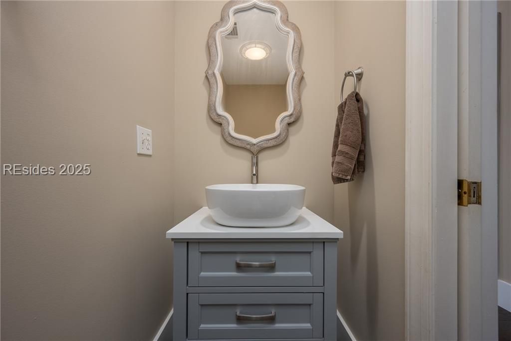 1 Spartina Crescent Bluffton, SC 29910 - Photo 51 of 67 Powder room off the hallway from the garage