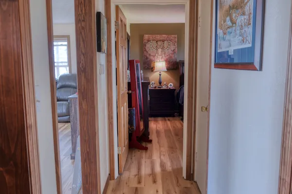 a view of a bedroom from a hallway