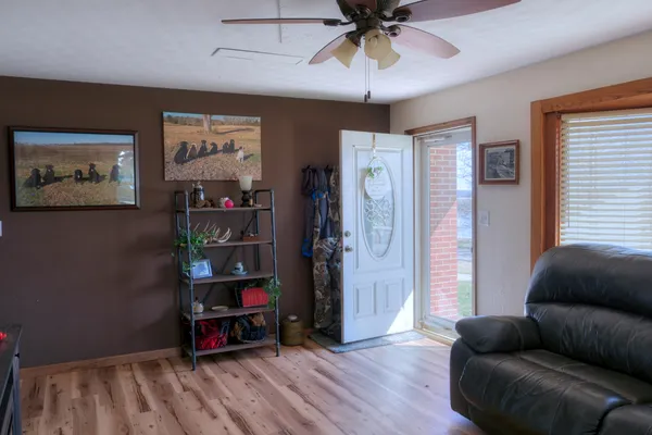 a living room with furniture and a window