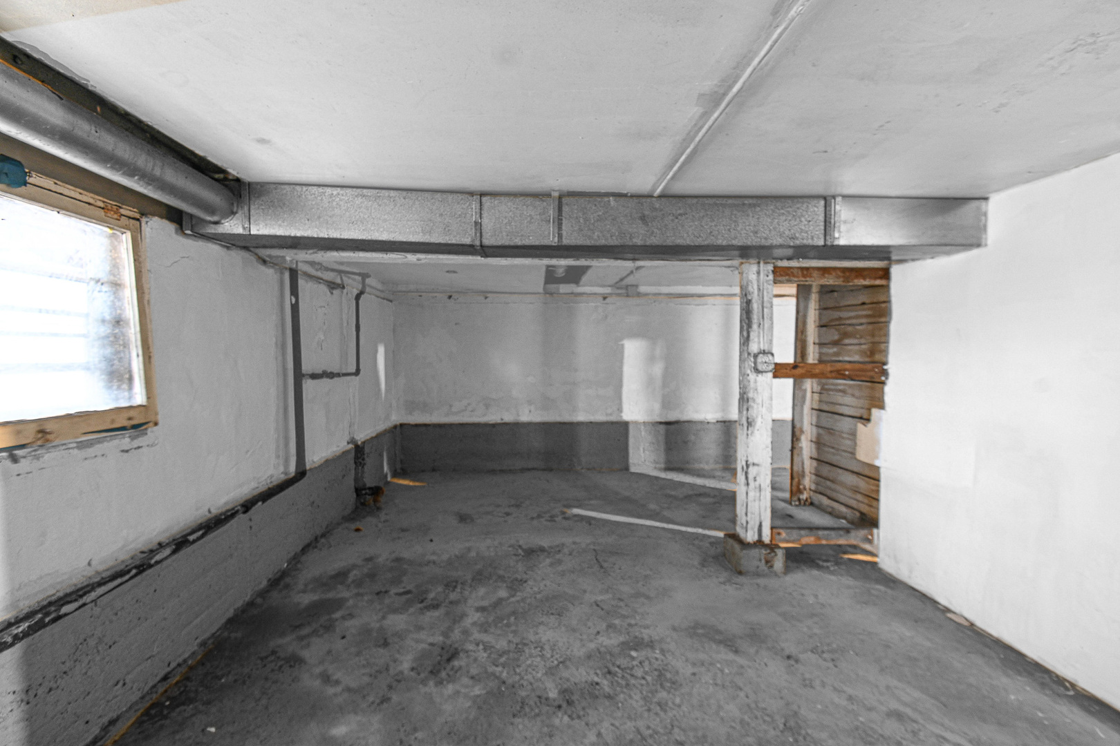 5607 South Laflin Street Chicago, IL 60636 - Photo 15 of 17 a view of empty room with wooden walls