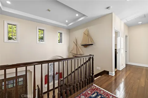 a very nice looking room with wooden floor